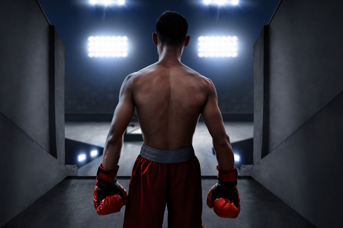 Boxer standing on boxing arena entrance